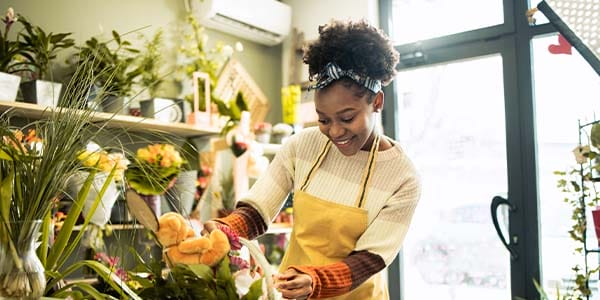A person working in a flower shop